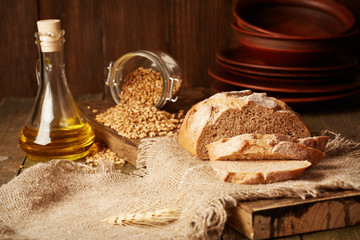 Whole grain bread sliced rustic background