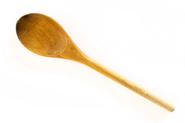 Wooden spoon on white background