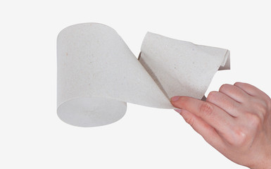 Hand pulls toilet paper on a white background