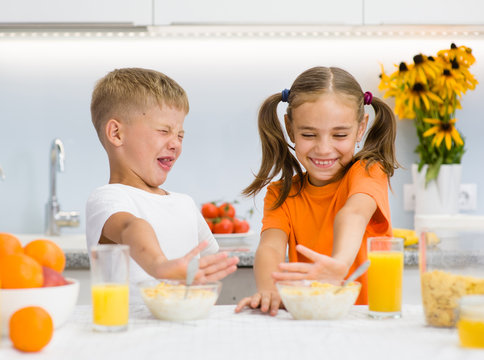 Children refuse to eat corn flakes with milk for breakfast