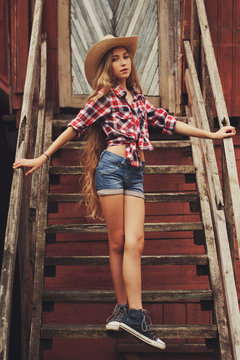 beautiful young cowgirl with long hair