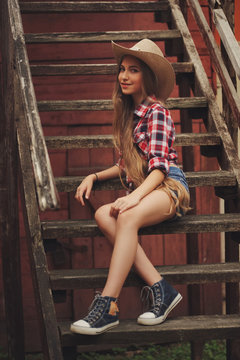 beautiful young cowgirl with long hair