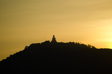 Fototapeta premium Phuket big buddha on top hill with sunset 