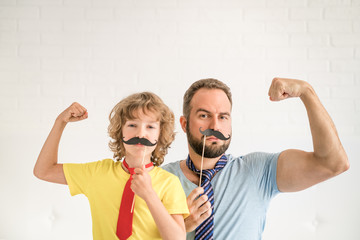 Happy family playing in home