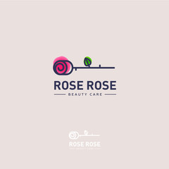   Rose logo. Rose emblem. The flower on a light - pink background and letters.