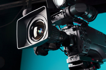 Film camera in the studio - Powered by Adobe