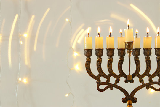 Image of jewish holiday Hanukkah background with menorah (traditional candelabra)
