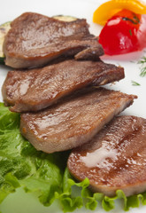 dishes of roast meat