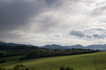 Fototapeta na wymiar Dramatic clouds, rain in distance. Slovakia