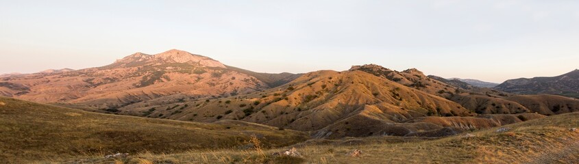 Amazing crimean hills landscape panorama at dawn, summertime, north-east Crimea