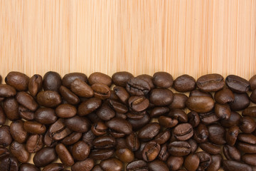 coffee beans on a wooden background