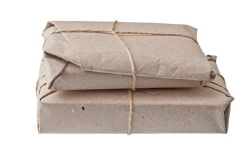 pile parcel wrapped with brown kraft paper