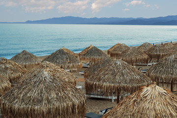 Umbrellas and beds, beaches of Greece