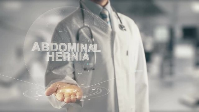 Doctor holding in hand Abdominal Hernia