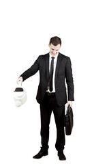 Businessman pouring water from watering can
