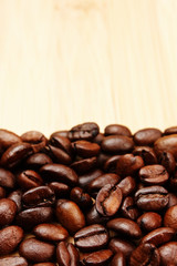 coffee beans on a wooden background