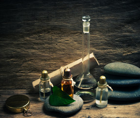 Fototapeta na wymiar Vials of perfume oils in fragrance lab
