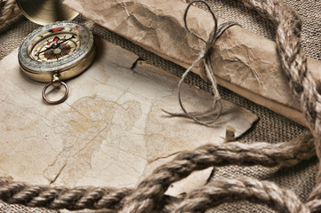 old paper with compass and rope