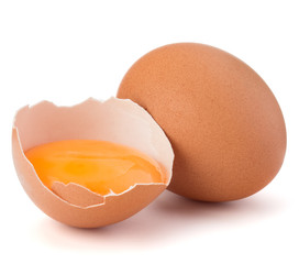 Broken egg in eggshell half and raw egg isolated on white background cutout