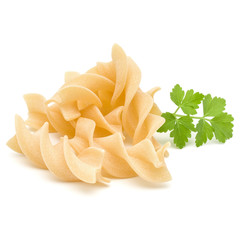 Italian  twisted pasta fusilli isolated on white background. Fusilloni, rotini.