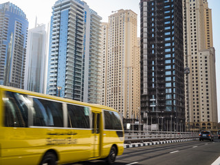Fototapeta na wymiar School bus in motion in Dubai, UAE