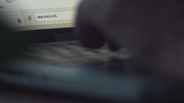 Chatting online. Male hands typing message on laptop keyboard