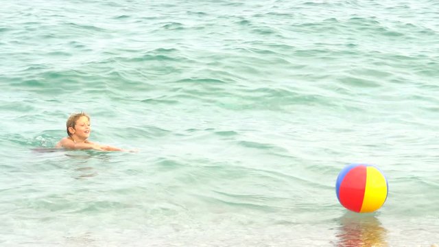 Happy Childeren On Beach, Laughing Little Girl And Young Man On Seashore Sea Waves On Coastline