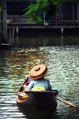 Obraz premium Seller on boat , floating market ,Thailand