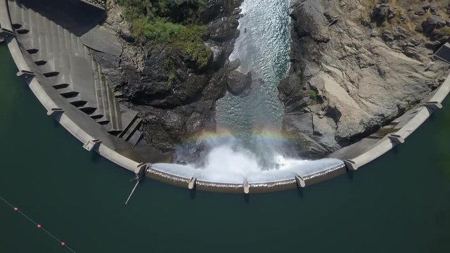 DRONE OVER LAKE CLEMENTINE DAM - Overview of mountain with rainbow