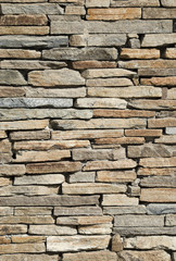 Old colorful stone wall closeup