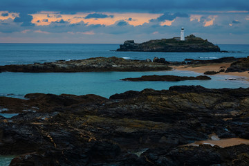 Godrevy Lighthouse in Cornwall, UK at dusk