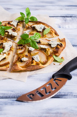 Traditional pizza with pear