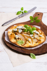 Traditional pizza with pear