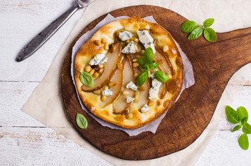 Traditional pizza with pear