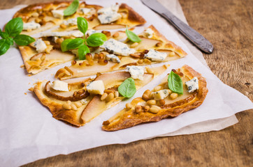 Traditional pizza with pear
