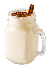 Homemade eggnog in mason jar isolated