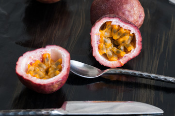passion fruit and spoon on the table