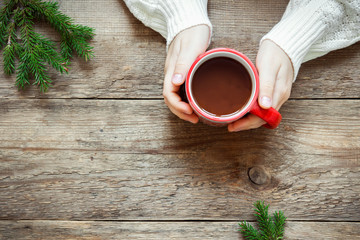 Hot chocolate in hands