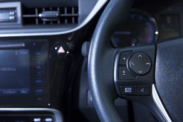 Cruise control button on the steering wheel