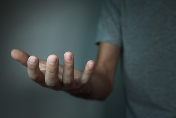 Man showing empty hand