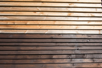 Obraz premium coating of construction wooden lining with protective means