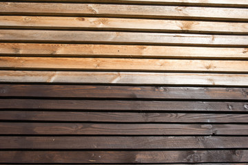 coating of construction wooden lining with protective means