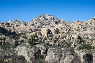Granitic rock formations in La Pedriza, Guadarrama Mountains National Park, Madrid, Spain