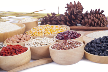Cereal grains , seeds, beans on wooden background
