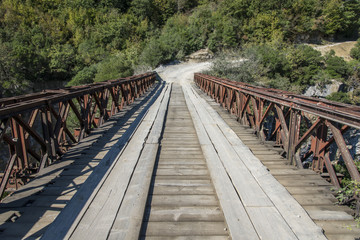 Obraz premium Old metal bridge over Osumi canyon, Albania