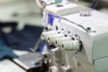 Sewing or overlock machine closeup, cloth industry