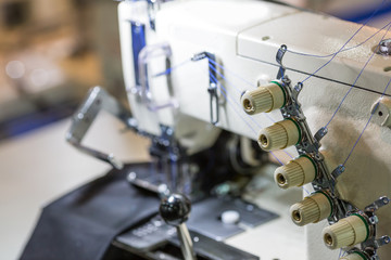 Sewing or overlock machine closeup, cloth industry