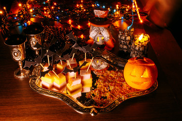 trick or treat, halloween tradition: entertainment by a holiday in the form of a canape, bats and the pumpkin head