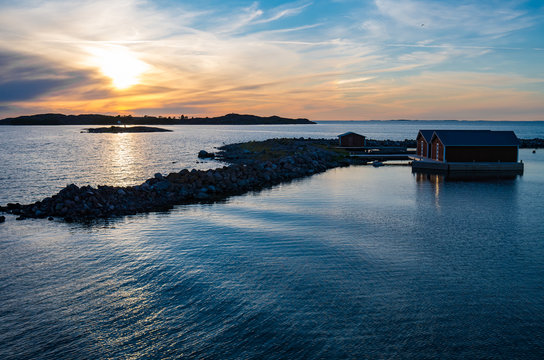 Sun reflecting in the still water near the Jurmo island in Finnish archipelago 