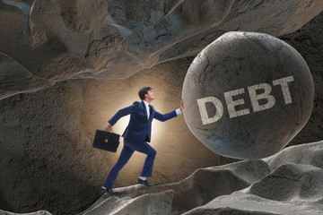 Businessman in high interest debt business concept